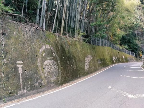 The Ghibli characters appear mysteriously on the moss wall in Japan