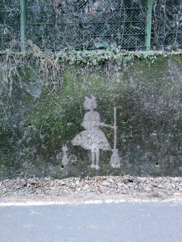 The Ghibli characters appear mysteriously on the moss wall in Japan